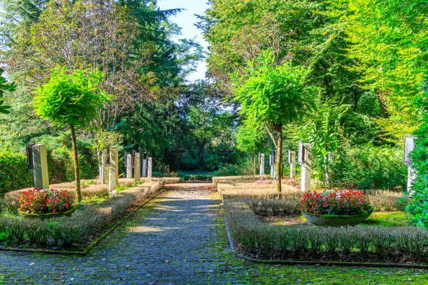 Public park on Vaalserberg mountain with Via Cruci Public park on Vaalserberg mountain with Via Cruci, paths between 14 stations surrounded by trees of surrounding forest, sunny autumn day in Vaals, South Limburg, Netherlands beautiful icons of the Netherlands stock pictures, royalty-free photos & images