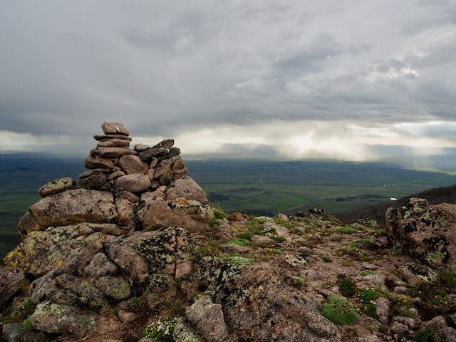Mountain trails above timberline are indicated by stacks of rocks called cairns. Do not disrupt these markers and don't add any more to the landscape.