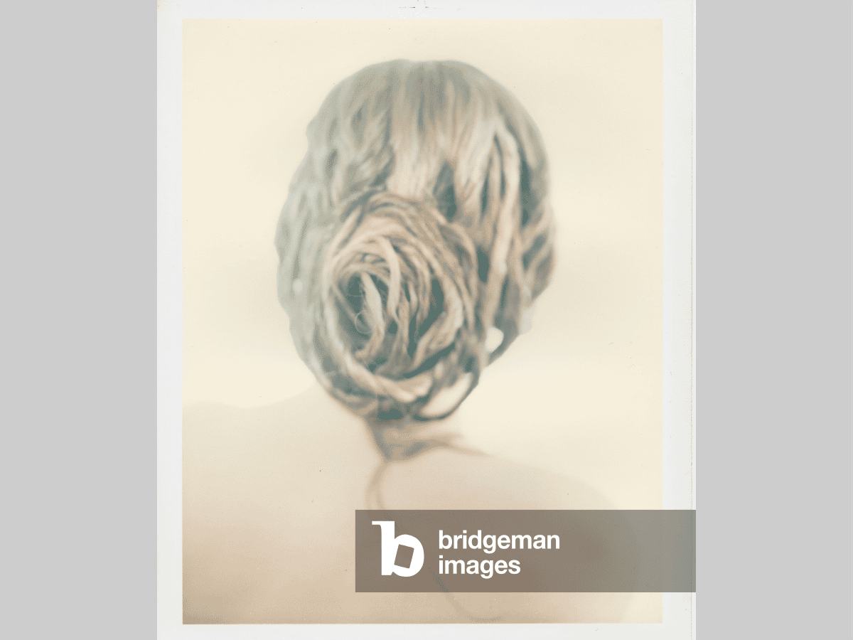 Feminine hairdo upper back