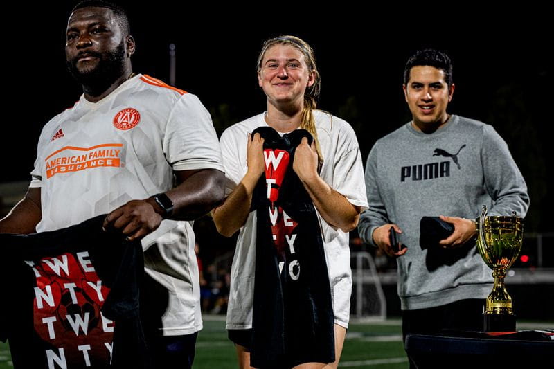 SOPFC players smiling post-championship win