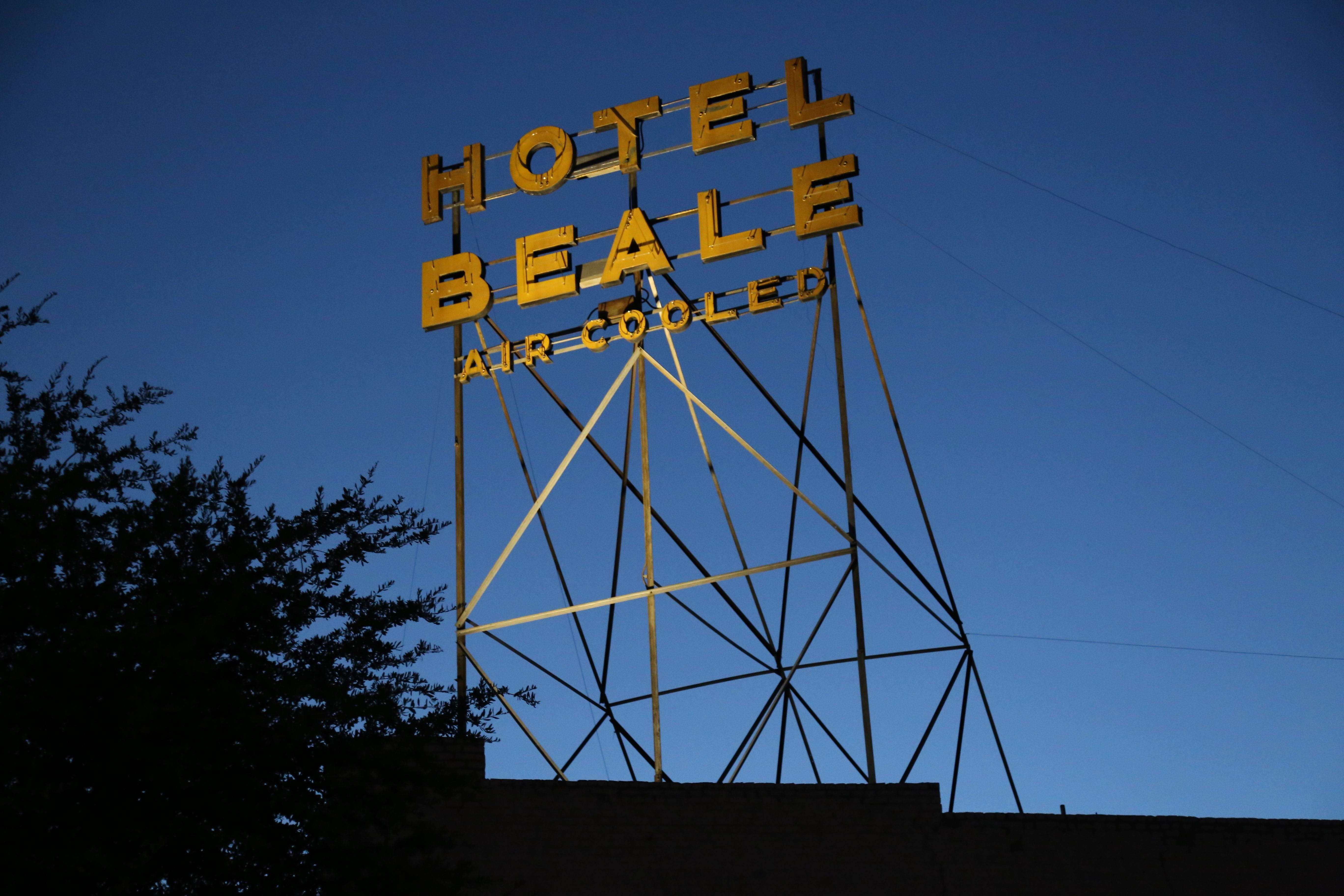 old neon sign that reads HOTEL BEALE AIR COOLED