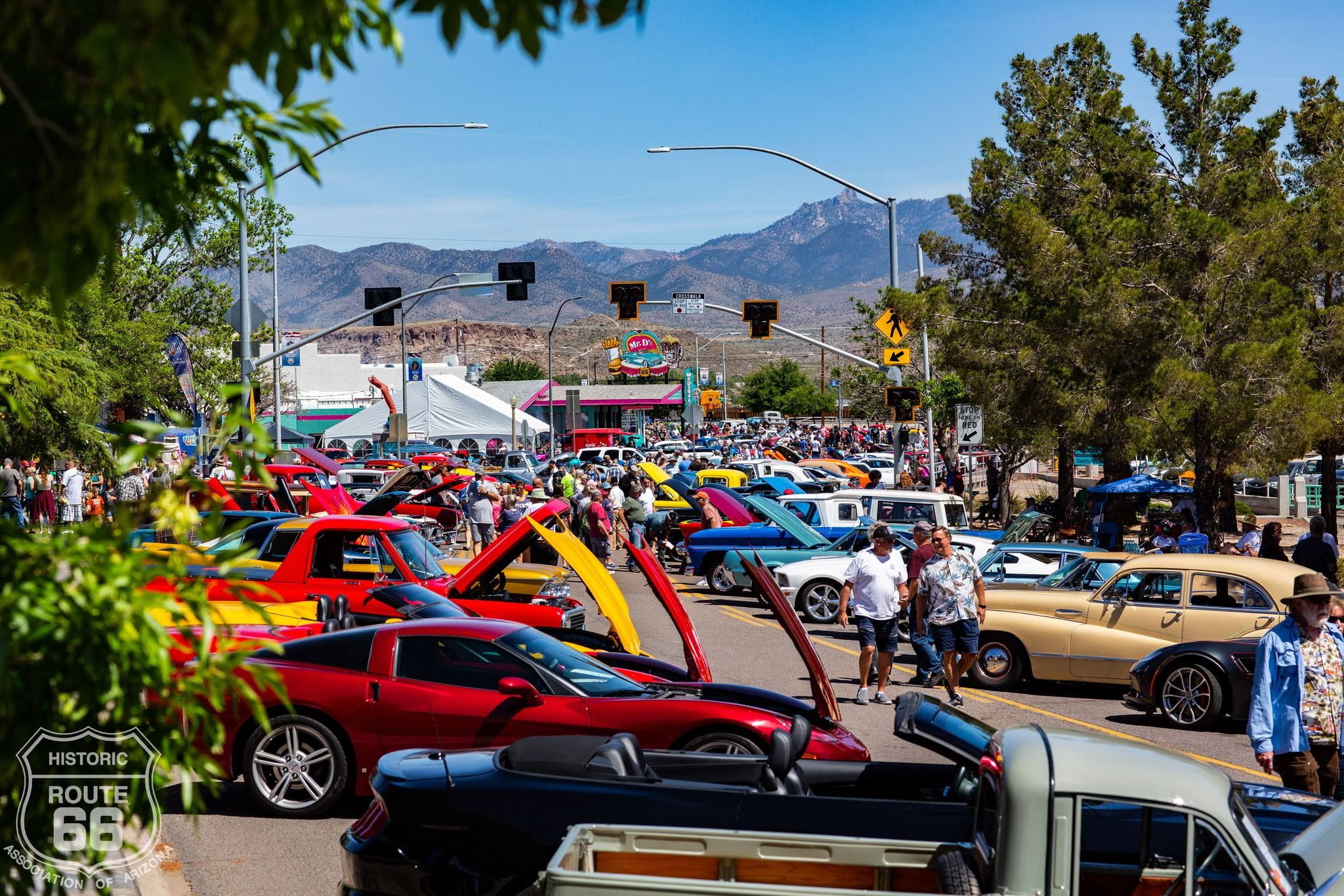 line of classic cars on the street
