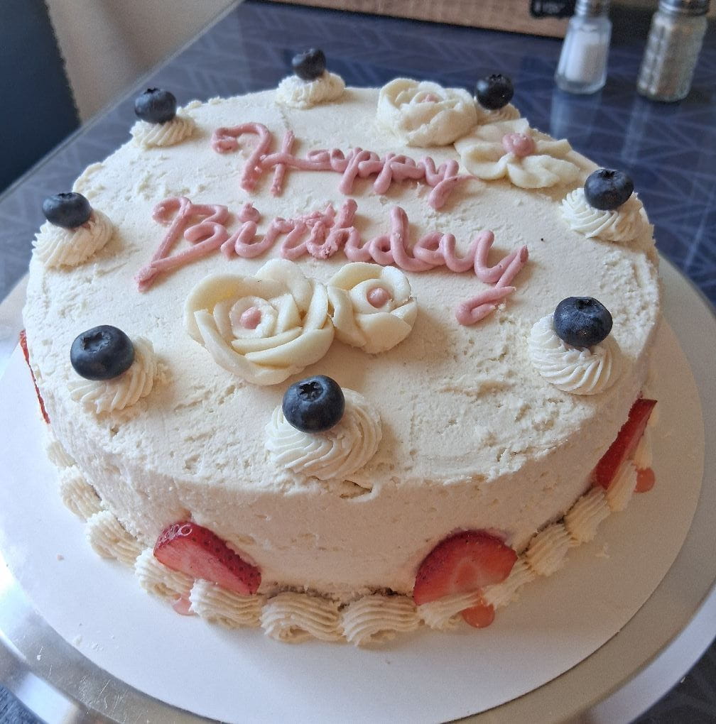 birthday cake that reads "happy birthday"