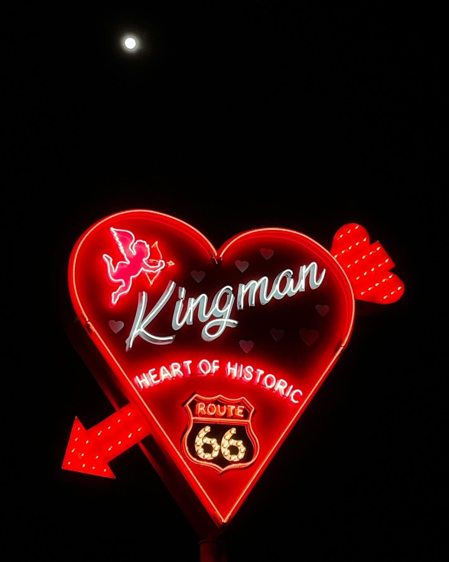 neon heart shaped sign that reads "Kingman Heart of Historic Route 66"
