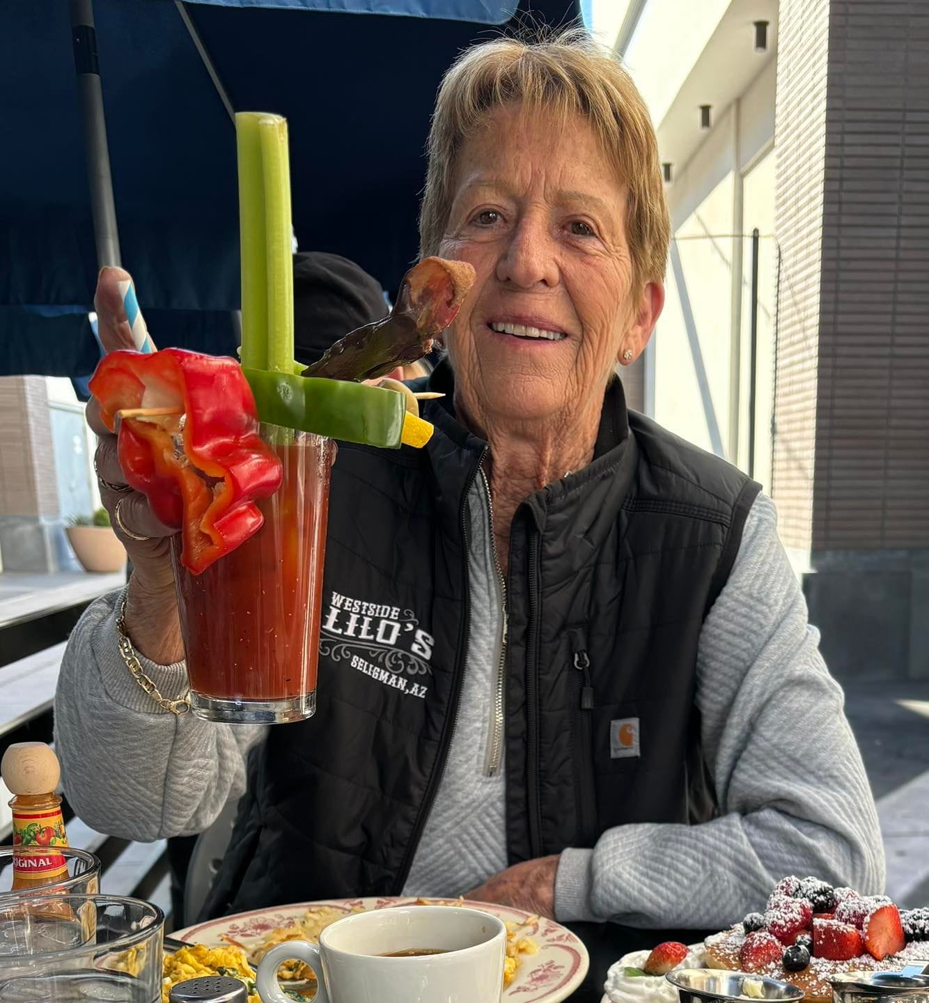 Image of woman holding a bloody mary