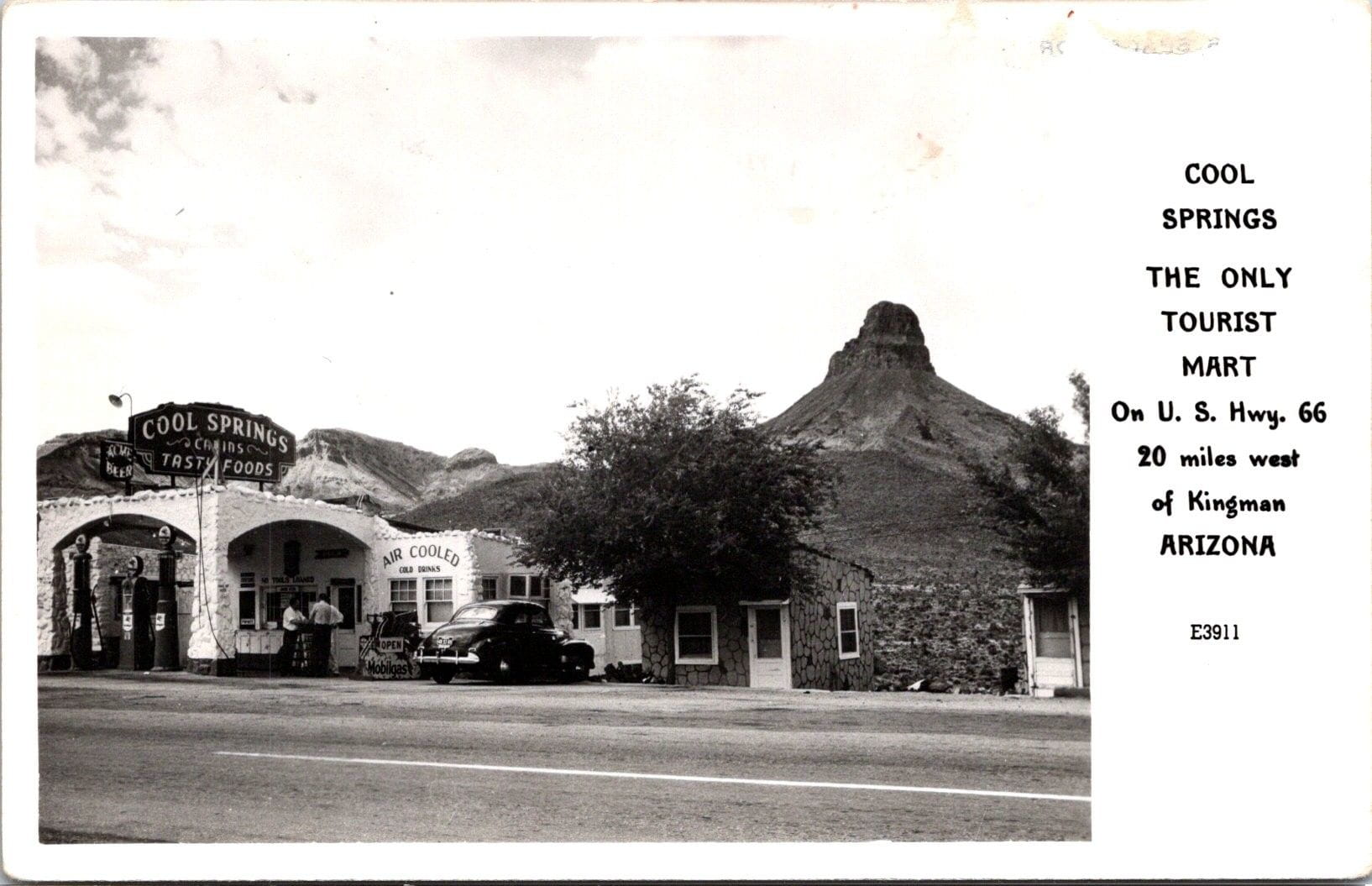 vintage postcard of cool springs station that reads "cool springs the only tourist mart on U.S. Highway 66 20 miles west of Kingman Arizona"